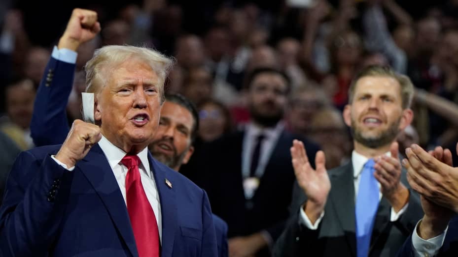 Republican presidential nominee and former U.S. President Donald Trump raises his fist during Day 1 of the Republican National Convention (RNC) at the Fiserv Forum in Milwaukee, Wisconsin, U.S., July 15, 2024. REUTERS/Elizabeth Frantz